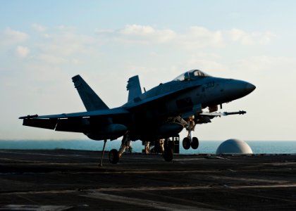 US Navy 111130-N-BT887-199 A jet lands aboard USS John C. Stennis
