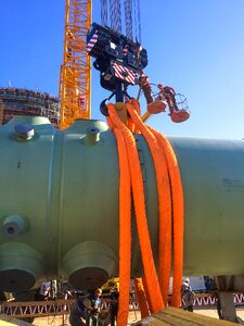 Construction slinger installation