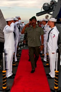US Navy 111127-N-ER662-545 Sideboys render honors to Brig. Gen. Filomeno da Paixao de Jesus, Deputy Chief of Defense Force for Timor-Leste, aboard