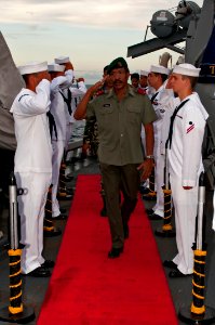 US Navy 111127-N-ER662-545 Sideboys render honors to Brig. Gen. Filomeno da Paixao de Jesus, Deputy Chief of Defense Force for Timor-Leste, aboard photo