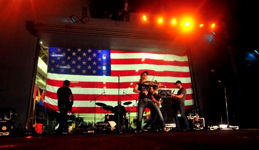 US Navy 111129-N-CT127-620 Natalie Stovall, a country music artist, and her band perform during a Navy Entertainment-sponsored concert aboard the S