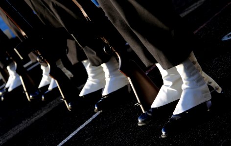 US Navy 111201-N-GZ277-304 The rifle detail aboard the Nimitz-class aircraft carrier USS Carl Vinson (CVN 70) stands at attention during a burial a