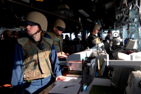 US Navy 111128-N-DU438-210 Officers stand watch in the ship's pilothouse during basic seamanship training aboard the guided-missile cruiser USS Get