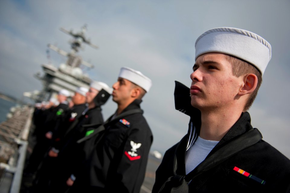 US Navy 111130-N-DR144-979 Sailors man the rails as Nimitz-class aircraft carrier USS Carl Vinson (CVN 70) departs Naval Air Station North Island f