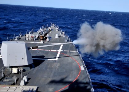 US Navy 111201-N-ZF681-148 The MK-45 5-inch-54-caliber lightweight gun aboard the guided-missile destroyer USS Halsey (DDG 97) fires during a live