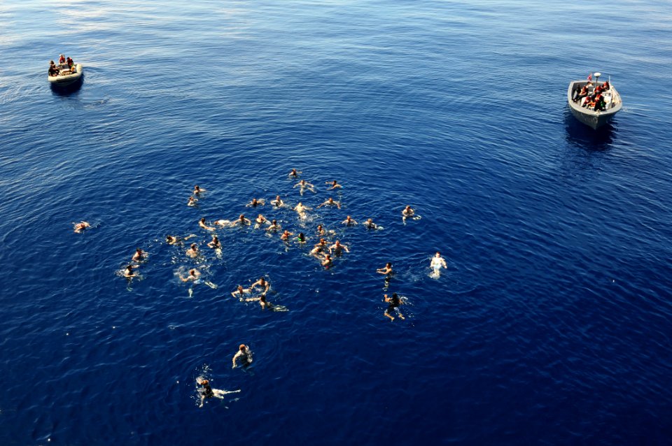 US Navy 111125-N-WA347-114 Sailors and Marines participate in a swim call from the multi-purpose amphibious assault ship USS Essex (LHD 2)