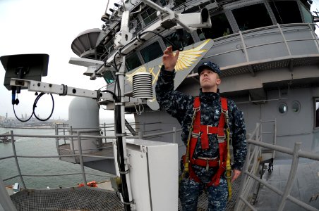 US Navy 111129-N-PO203-114 A Sailor checks an automated shipboard weather observation system