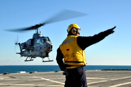 US Navy 111130-N-YX169-130 A helicopter departs the ship