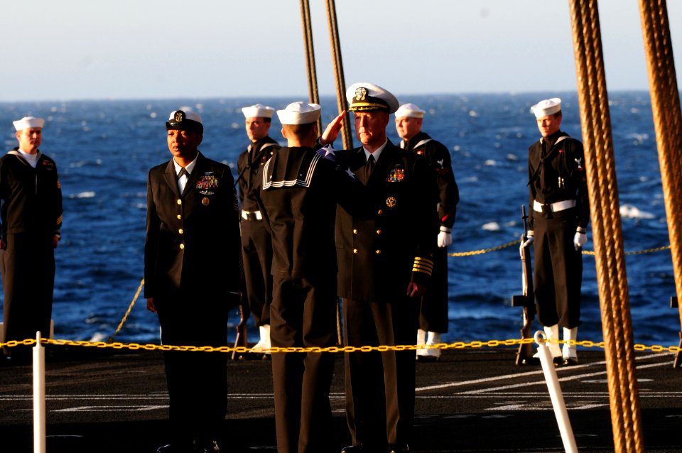 US Navy 111201-N-RG587-131 Capt. Bruce H. Lindsey, commanding officer of the Nimitz-class aircraft carrier USS Carl Vinson (CVN 70), is presented w
