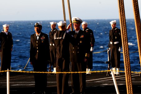 US Navy 111201-N-RG587-131 Capt. Bruce H. Lindsey, commanding officer of the Nimitz-class aircraft carrier USS Carl Vinson (CVN 70), is presented w