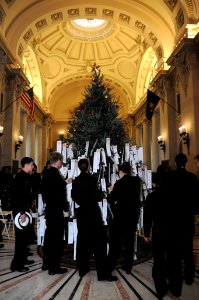 US Navy 111129-N-OA833-001 U.S. Naval Academy Midshipmen gather around the Giving Tree in Bancroft Hall photo