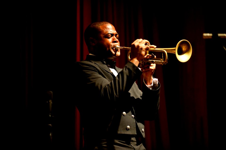 US Navy 111203-N-CZ945-252 Musician 3rd Class Michael Bookman, assigned to the U.S. 7th Fleet Band, plays the trumpet for more than 500 people at t