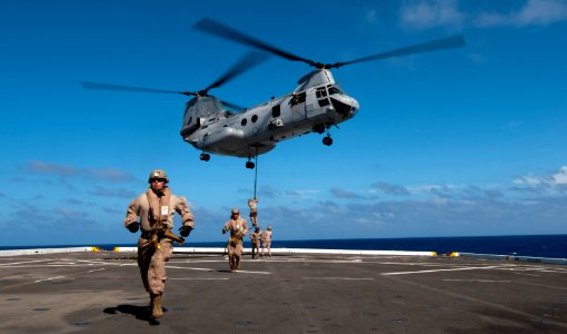 US Navy 111202-N-PB383-783 Marines assigned to the Maritime Raid Force of the 11th Marine Expeditionary Unit (11th MEU) fast rope onto the amphibio