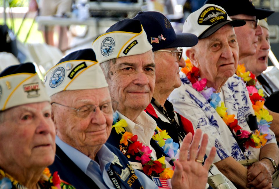 US Navy 111204-N-RI884-035 Pearl Harbor survivors observe the U.S. Naval Sea Cadets Concert Band of the West perform at the Pearl Harbor Visitor's