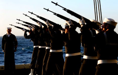 US Navy 111201-N-GZ277-339 The rifle detail aboard the Nimitz-class aircraft carrier USS Carl Vinson (CVN 70) fires three volleys during a burial a photo