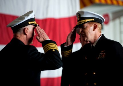 US Navy 111202-N-DR144-497 Capt. Kent D. Whalen, right, relieves Capt. Bruce H. Lindsey as the commanding officer of the Nimitz-class aircraft carr
