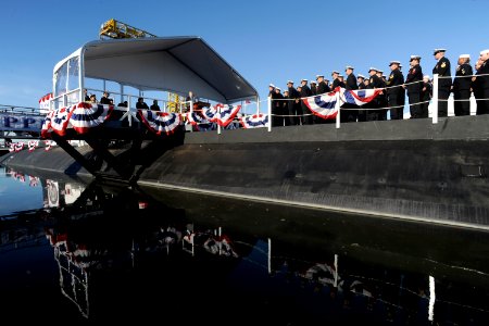 US Navy 111203-N-UM744-001 Sailors assigned to the Virginia-class attack submarine Pre-Commissioning Unit (PCU) Mississippi (SSN 782) look on as Se photo