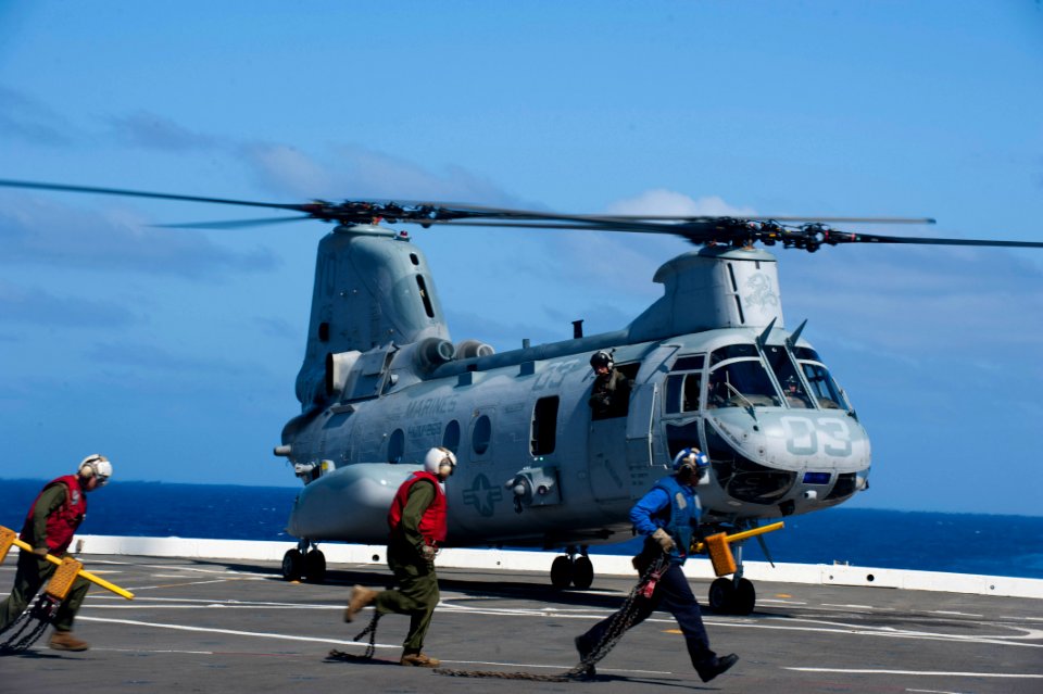 US Navy 111202-N-PB383-077 Marines and Sailors remove chocks and chains