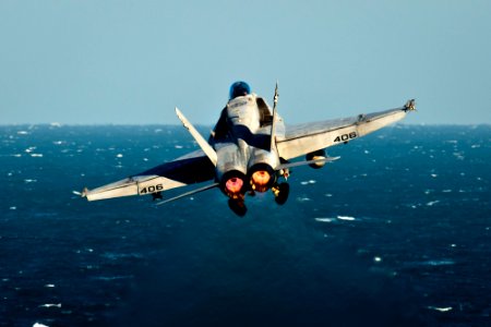 US Navy 111203-N-BT887-402 An F-A-18C Hornet assigned to the Golden Dragons of Strike Fighter Squadron (VFA) 192 launches from the Nimitz-class air