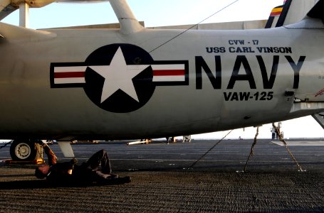 US Navy 111202-N-GZ277-045 Aviation Electrician's Mate Airman Joseph Hallman, assigned to Carrier Airborne Early Warning Squadron (VAW) 125, cleans