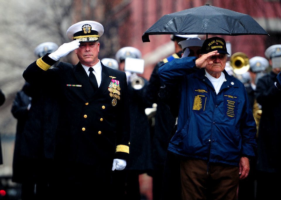 US Navy 111207-N-KV696-034 Rear Adm. Patrick J. Lorge and Frank Yanick render honors during a wreath laying ceremony at the U.S. Navy Memorial