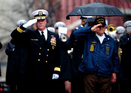 US Navy 111207-N-KV696-034 Rear Adm. Patrick J. Lorge and Frank Yanick render honors during a wreath laying ceremony at the U.S. Navy Memorial photo