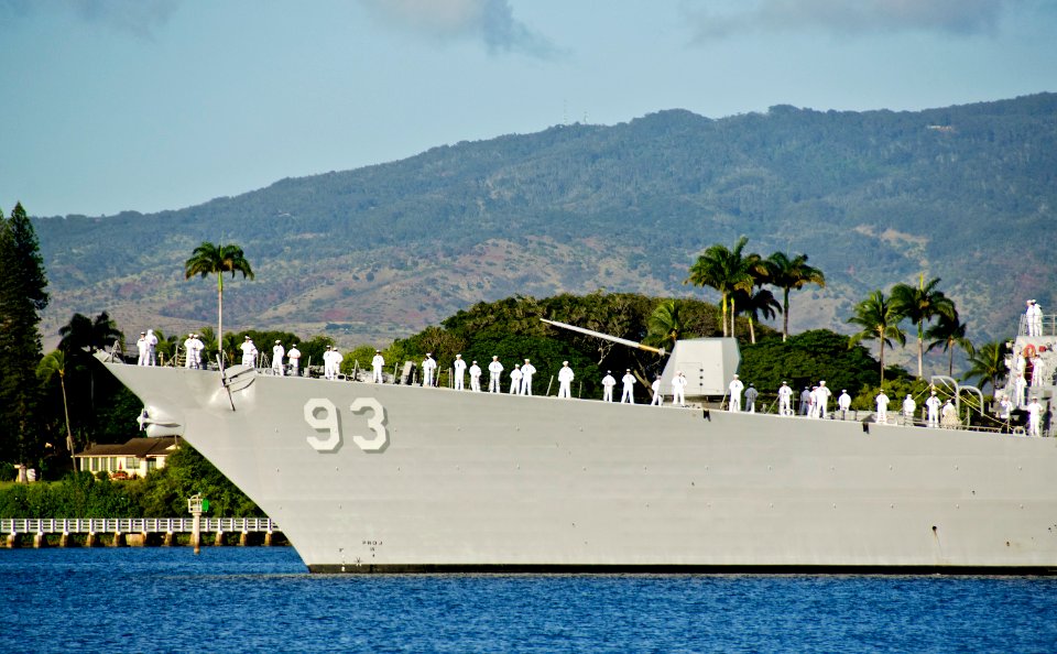 US Navy 111207-N-RI884-085 Sailors aboard the Arleigh-Burke class guided-missile destroyer USS Chung-Hoon (DDG 93) render honors during a U.S. Navy