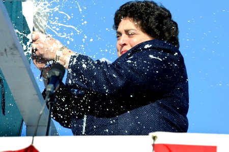 US Navy 111203-N-UM744-003 Ship sponsor Allison Stiller christens the Virginia-class attack submarine Pre-Commissioning Unit (PCU) Mississippi (SSN