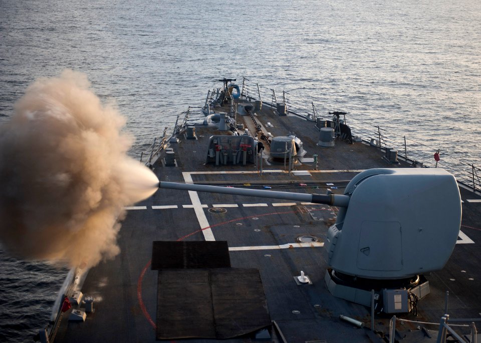 US Navy 111206-N-FI736-139 The Mk-45 5-inch-54 caliber lightweight gun aboard the Arleigh Burke class guided-missile destroyer USS Porter (DDG 78)