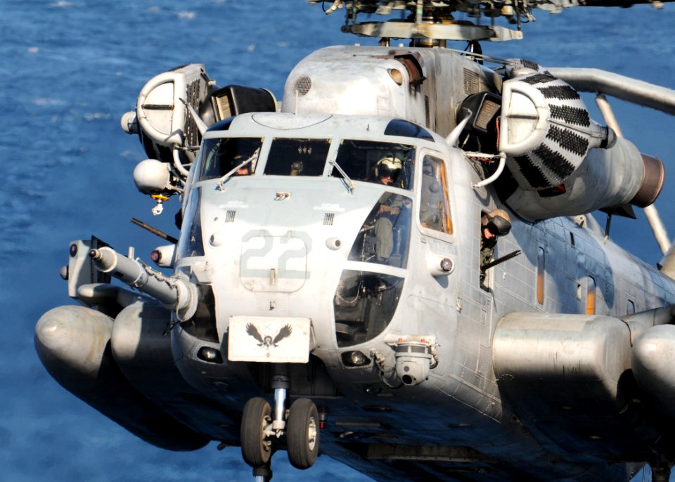 US Navy 111205-N-VE788-087 A CH-53 Sea Stallion helicopter assigned to Marine Medium Tiltrotor Squadron (VMM) 261 lands aboard the multi-purpose am