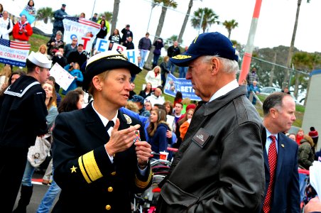 US Navy 111208-N-DG679-081 ear Adm. Nora Tyson, commander of Carrier Strike Group (CSG) 2, speaks with Vice President Joe Biden while they wait for