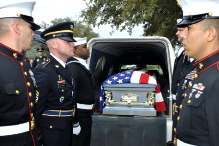 US Navy 111207-N-GO535-462 An honor detail from Navy Operational Support Center (NOSC) Waco takes part in the funeral of Pearl Harbor survivor Boat