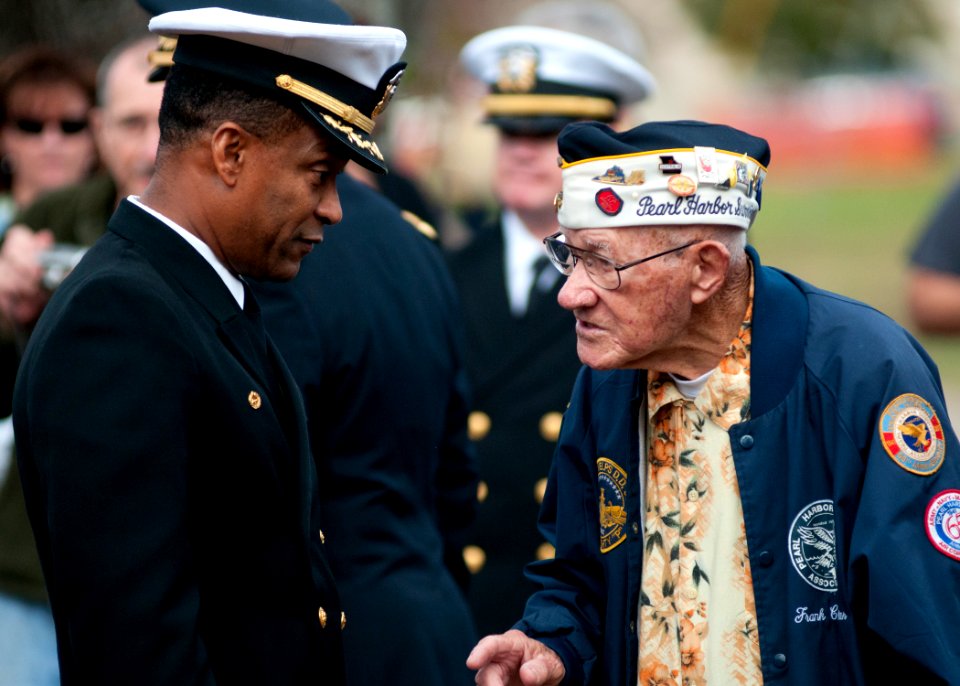 US Navy 111207-N-OV802-055 Frank Chebetar, president of the Pearl Harbor Survivors Association, Tidewater Chapter 2, speaks with Capt. Charles L. S