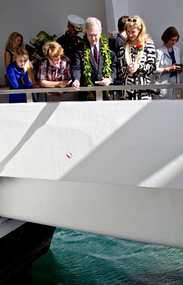 US Navy 111207-N-RI884-449 The honorable Ray Mabus drops a flower petal over the USS Arizona Memorial