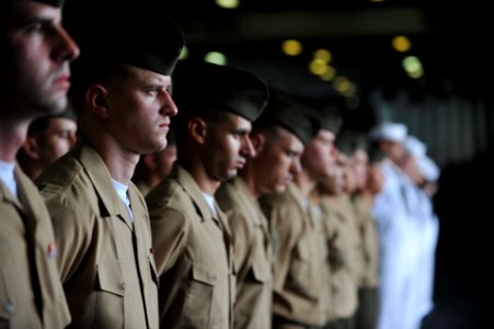 US Navy 111207-M-CR943-095 Marines assigned to the 11th Marine Expeditionary Unit (11th MEU) stand in formation during a ceremony aboard the amphib