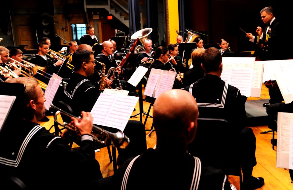 US Navy 111204-N-CD297-008 Lt. Patrick Sweeten, band director of U.S. Navy Band Great Lakes, leads the ensemble as they perform during the band's W