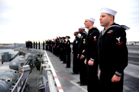 US Navy 111208-N-XE109-156 Sailors man the rails as the aircraft carrier USS George H.W. Bush (CVN 77) pulls into Mayport, Fla