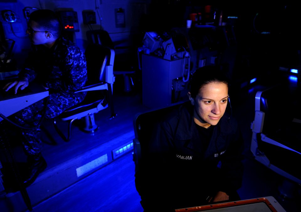 US Navy 111208-N-GZ277-082 Air Traffic Controller Airman Sarah Varjan stands watch at final control in the carrier air traffic control center aboar