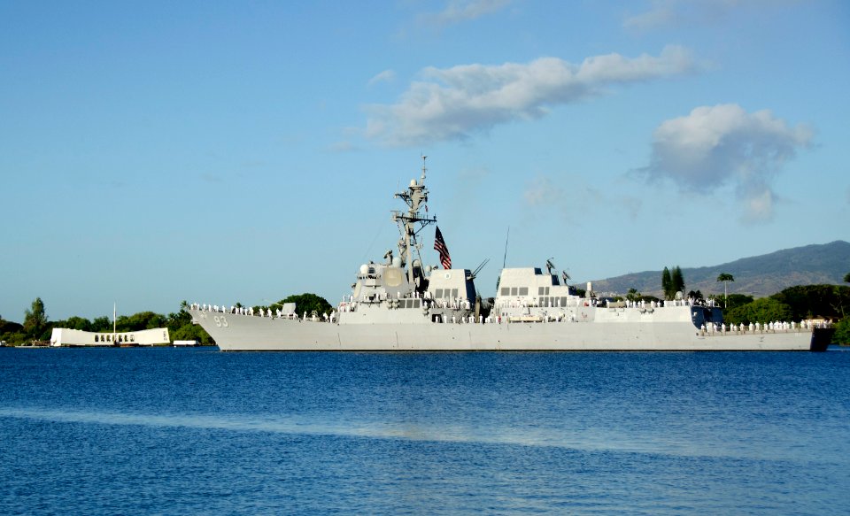 US Navy 111207-N-RI884-096 The Arleigh Burke-class guided-missile destroyer USS Chung-Hoon (DDG 93) passes the USS Arizona Memorial during a U.S. N