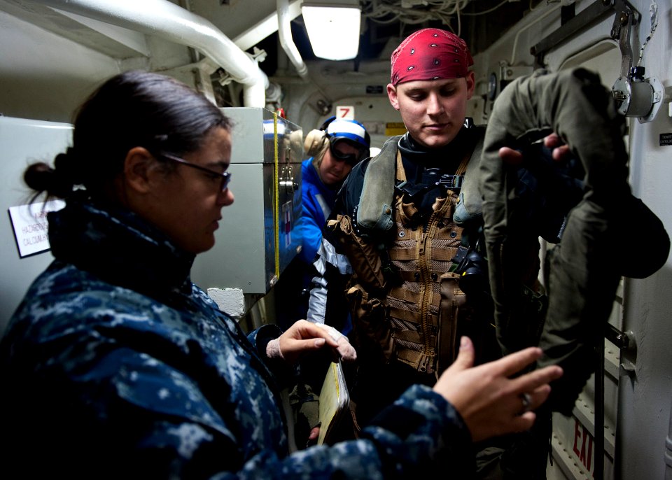 US Navy 111208-N-FI736-081 A Sailor gives a flight safety briefing