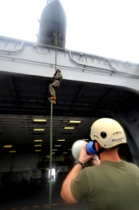 US Navy 111209-N-KD852-132 Marines assigned to the 11th Marine Expeditionary Unit (11th MEU) conduct fast roping training aboard the amphibious ass
