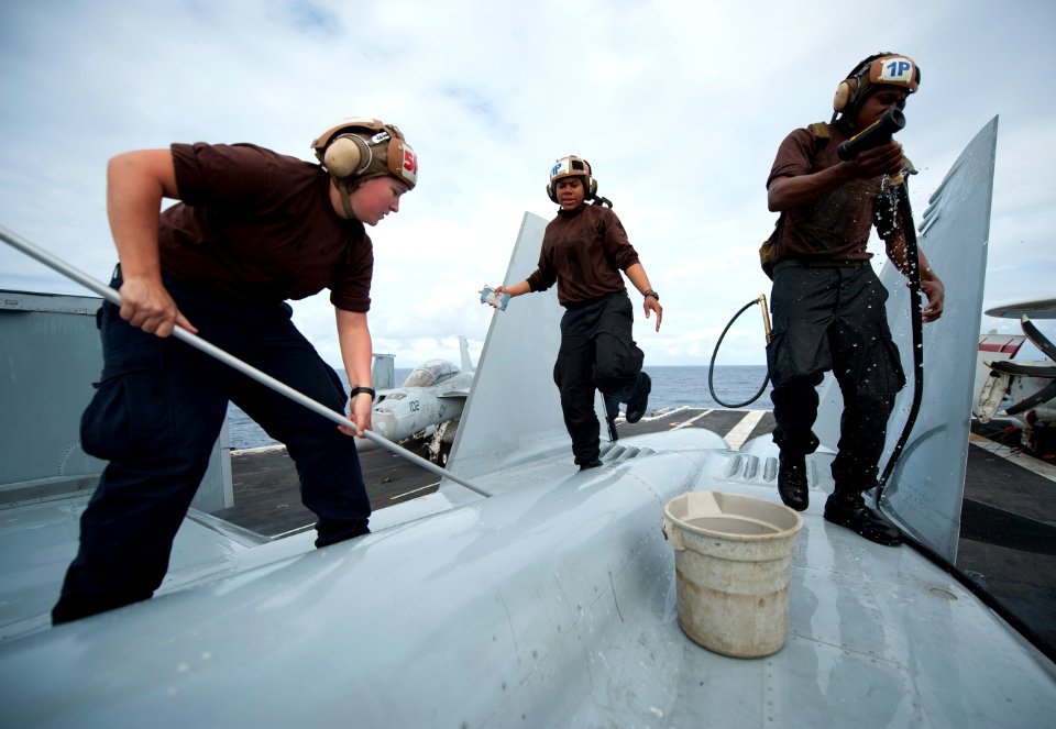 US Navy 111206-N-DR144-601 Aviation Machinist's Mate Airman Katie Griffith, Aviation Electronics Technician 3rd Class Veronica Calhoun and Aviation