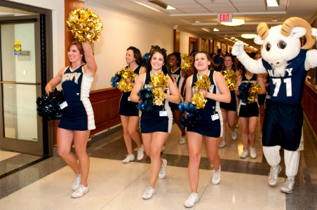 US Navy 111209-N-PM781-011 The U.S. Naval Academy Cheerleading Squad and Bill the Goat, the U.S. Naval Academy mascot, perform during a pep-rally a
