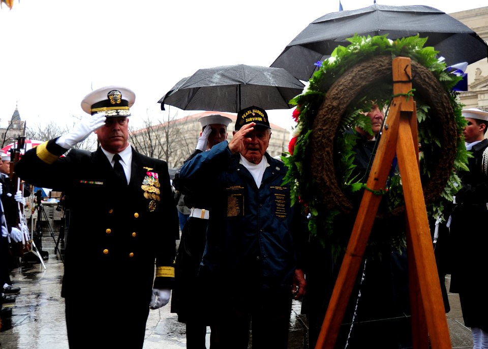 US Navy 111207-N-KV696-075 Rear Adm. Patrick J. Lorge and Frank Yanick render honors during a wreath laying ceremony at the U.S. Navy Memorial