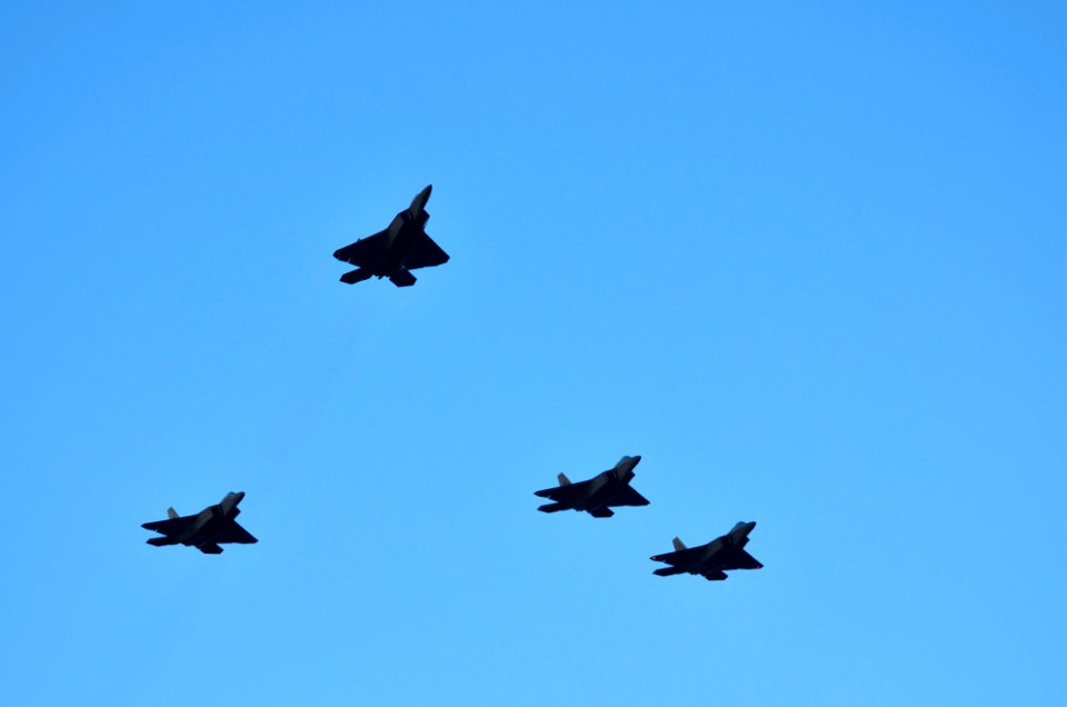 US Navy 111207-N-WP746-260 Jets perform a missing man flyover formation during the 70th anniversary of Pearl Harbor Day