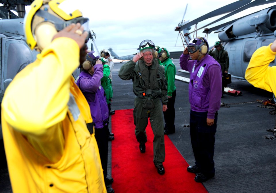 US Navy 111208-N-TB177-001 Rear Adm. Ted Branch, commander of Naval Air Forces Atlantic, passes through sideboys aboard the aircraft carrier USS Ge