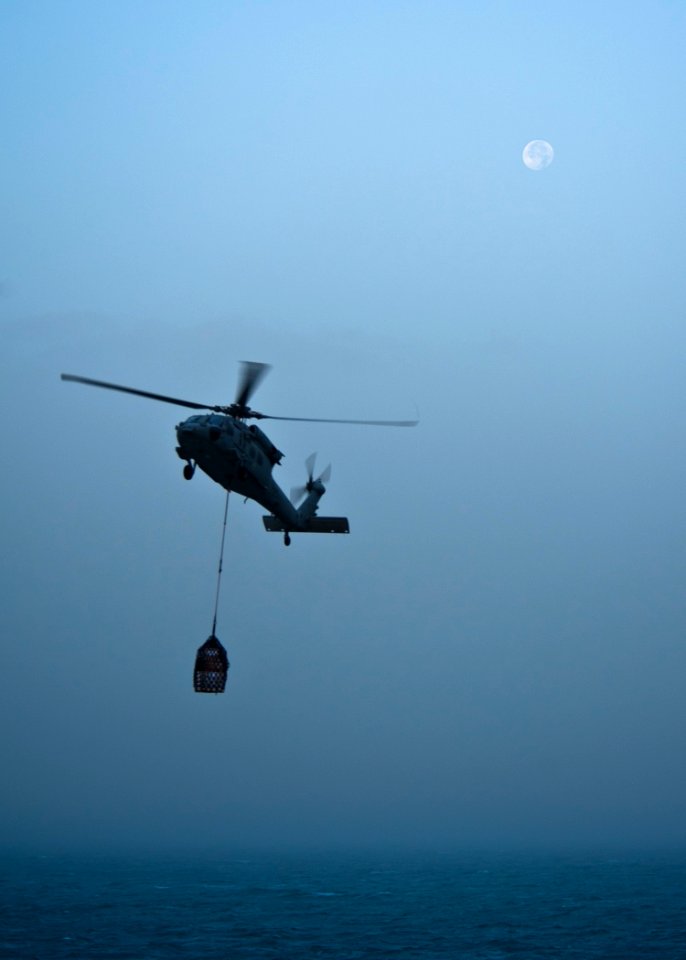 US Navy 111212-N-BT887-058 An MH-60S Sea Hawk helicopter, assigned to the Eightballers of Helicopter Sea Combat Squadron (HSC) 8, conducts a vertic