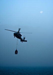 US Navy 111212-N-BT887-058 An MH-60S Sea Hawk helicopter, assigned to the Eightballers of Helicopter Sea Combat Squadron (HSC) 8, conducts a vertic