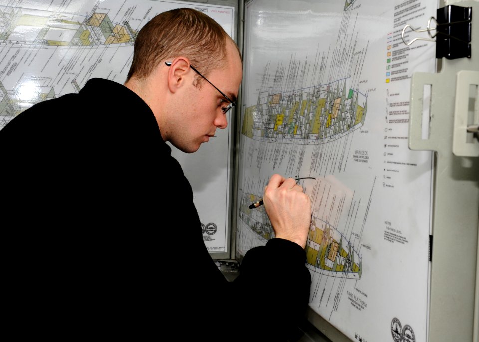 US Navy 111208-N-FI736-187 A Sailor plots the location of a casualty during a training exercise