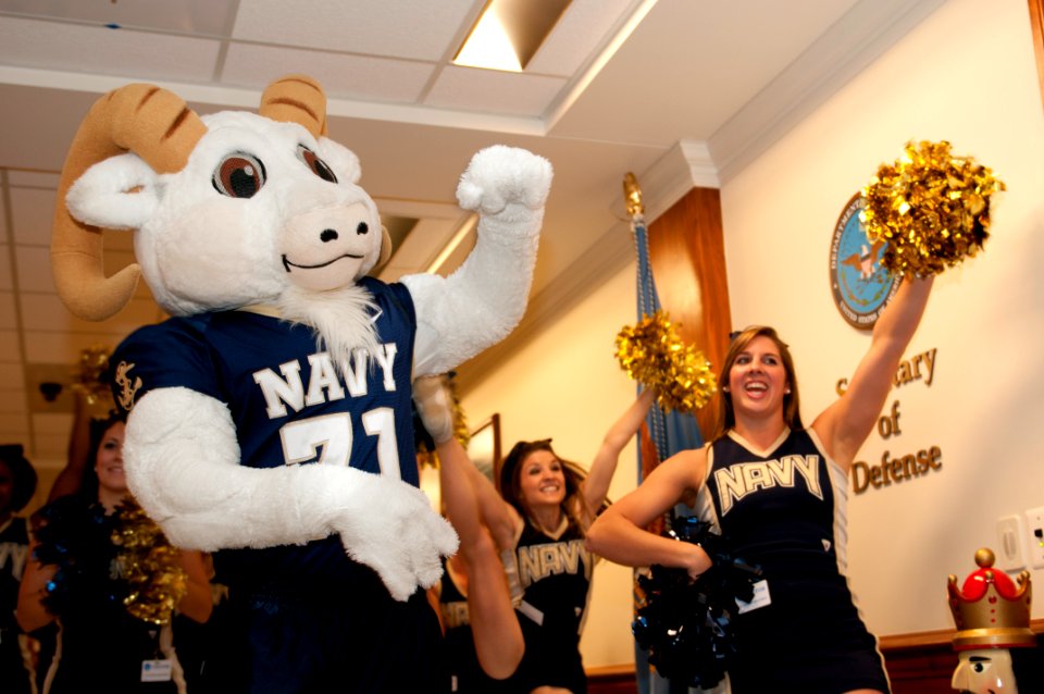US Navy 111209-N-PM781-005 ill the Goat, the U.S. Naval Academy mascot, and the U.S. Naval Academy Cheerleading Squad perform during a pep-rally at